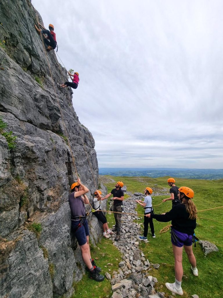 group of students climbing